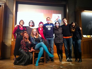 SexWeekAtYale2012 Reid Mihalko, student officers of SWAY (Sex Week At Yale), and Bawdy Storytelling performers smiling for a group photo on stage at Yale's Harkness Hall's auditorium.