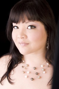 Social media consultant and adult performer Kelly Shibari wearing a fashionable beaded necklace
