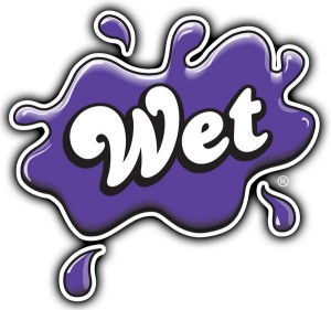 The purple "splat" logo for Wet Lube