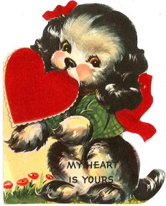 Valentine Card of Puppy holding cardboard heart