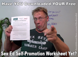 Sex and relationship educator Reid Mihalko holding up his free downloadable sex ed marketing worksheet with the text "How you downloaded your free sex ed self-promotion worksheet yet?" in LOL Cat style letters