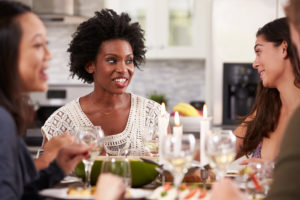 Group Of Friends Enjoying Dinner Party At Home