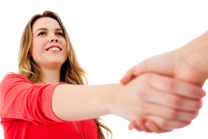 Casual handshake - isolated over a white background