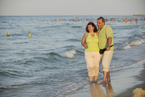 Happy Seniors Couple On Beach