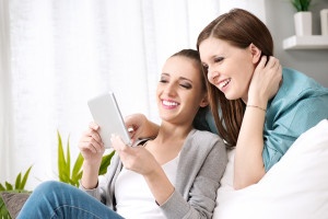 Smiling Girls With Tablet