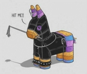 Picture of the common meme of a naughty BDSM piÃ±ata wearing a leather mask, holding a riding crop in their mouth, with the speech bubble "Hit me" coming out of it's mouth