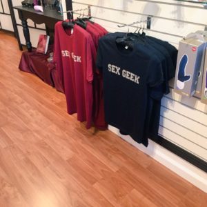 Sex and relationship educator Reid Mihalko of ReidAboutSex.com's famous Sex Geek tshirts hanging in Santa Cruz' Pure Pleasure adult botique