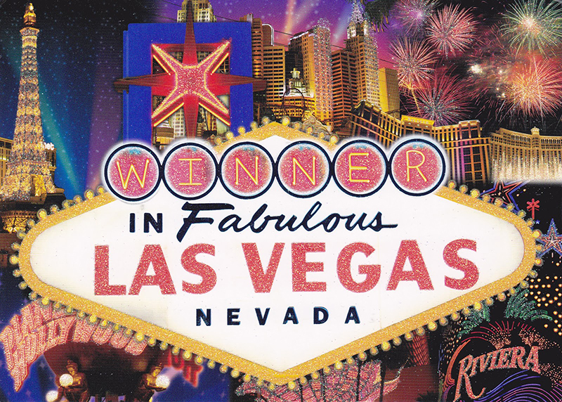 Postcard image of Las Vegas casino facades with the words "Winner in Fabulous Las Vegas Nevada" in the middle of the postcard with flashing sign lights around it