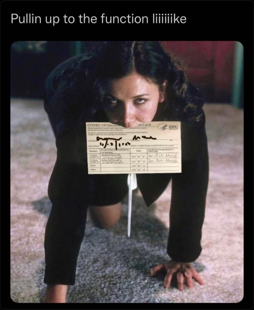 Image from the movie Secretary of actress Maggie Gyllenhaal crawling across the office carpet with a letter in her mouth; however, the letter has been replaced via Photoshop with a vaccination card complete with booster details, and the meme description, "Pullin up to the function liiiike"