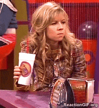 GIF of woman crushing a cup of soda with her hand
