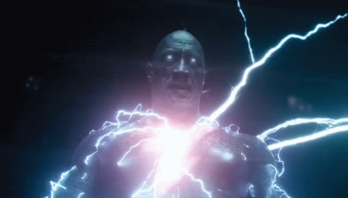 GIF of Black Adam with lighting sparking across his body