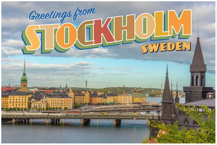 Classic Postcard image with the words Greetings from Stockholm Sweden. The Background is an image looking over the back with a bridge and city buildings in the background.