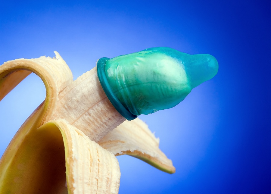 Banana wearing a condom. Horizontally framed shot. ** Note: Shallow depth of field