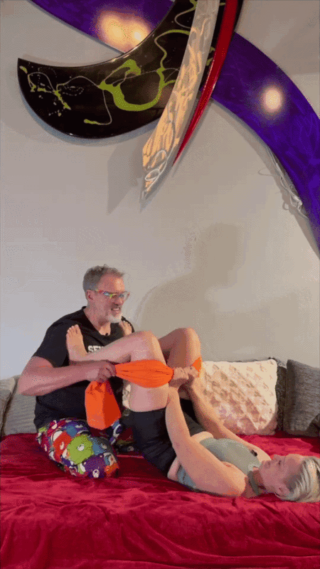 GIF of Reid demonstrating various positions with a co-facilitator