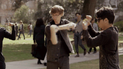 campus full of students practicing magic hand movements resonant of Tai Chi